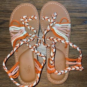 Orange sandals.  Never worn.